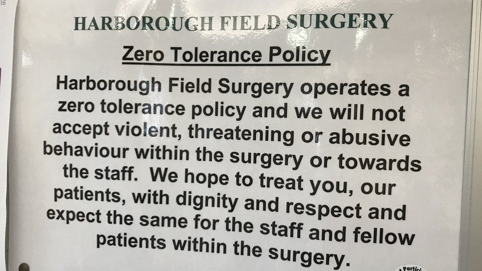 A zero tolerance sign in a doctors surgery