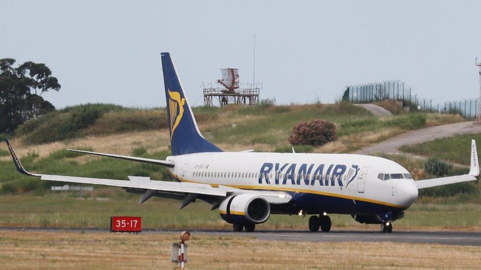A Ryanair plane lands at Lisbon airport
