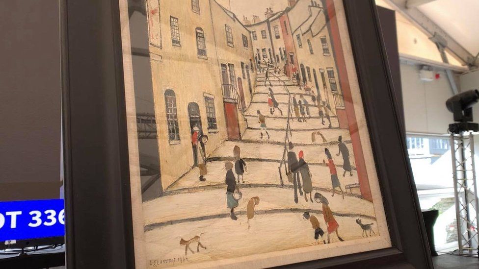 LS Lowry's The Street With Many Steps for auction in Douglas