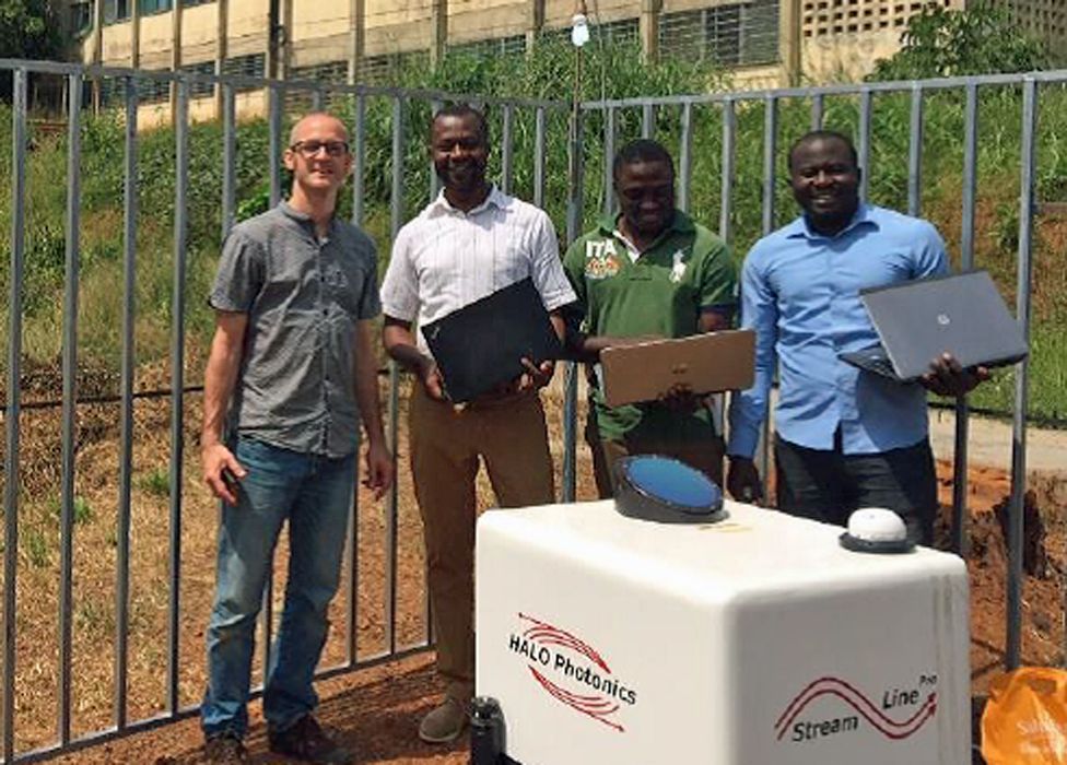 Climate specialists: L-R: Sebastian Engelstaedter, Wilfried Pokam, Giresse Kuete, Thierry Taguela with a Lidar in Yaounde, Cameroon