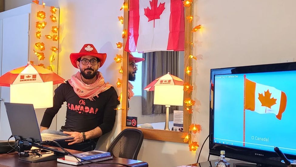 Hassan al-Kontar attending a remote Canadian citizenship ceremony