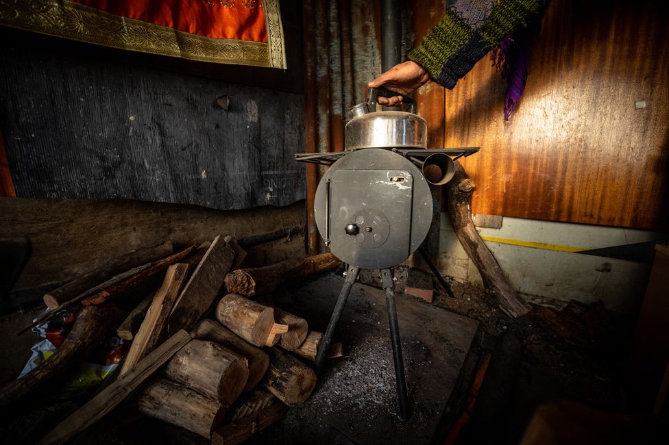 The wood-burning stove and kettle