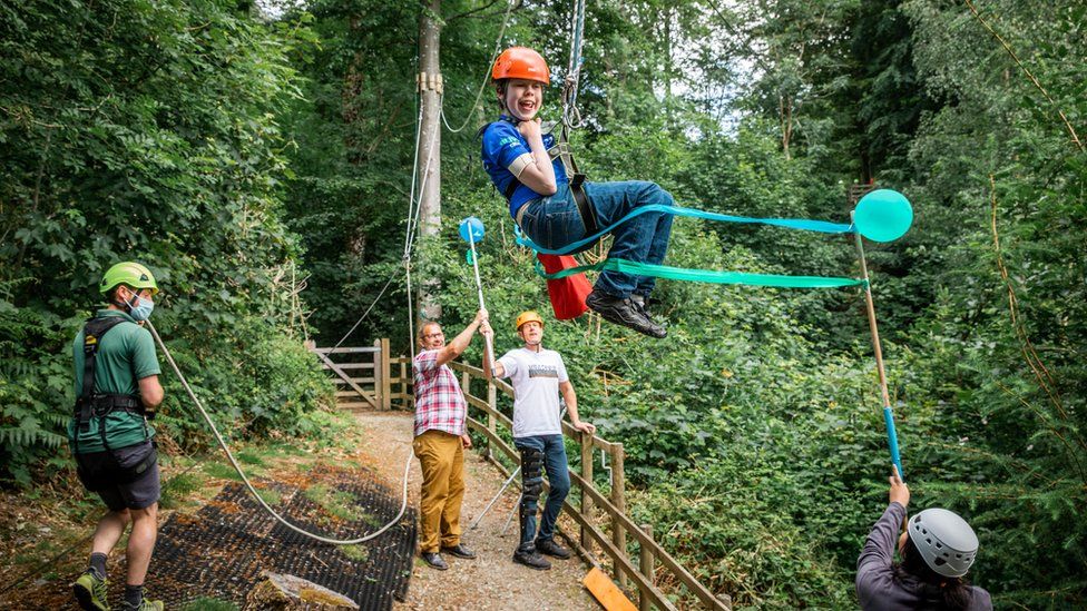 Oliver Voysey completing a zip-line at the outdoor centre