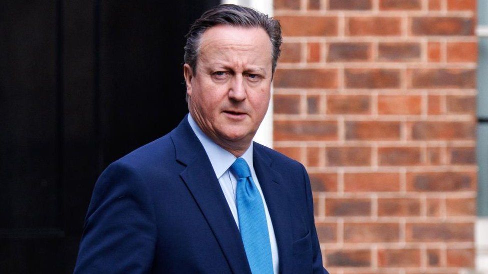 David Cameron looks stern