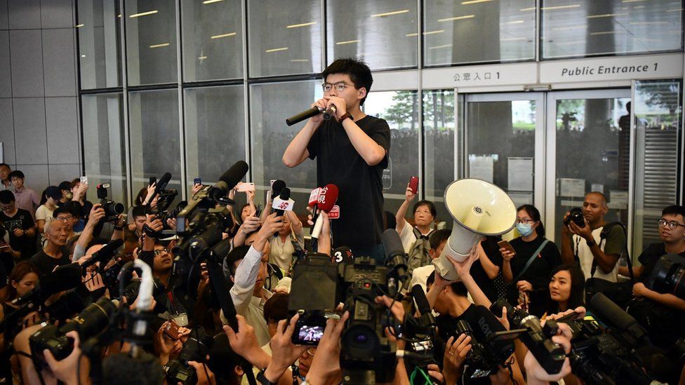 Joshua Wong speaks to the media and supporters outside the Legislative Council in Hong Kong, shortly after being released from prison on June 17th 2019