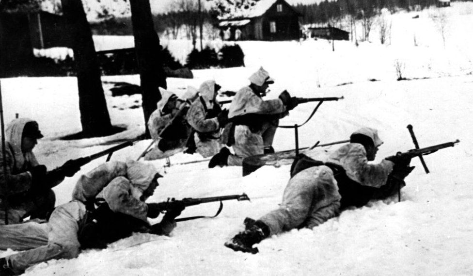 Wearing white clothing as camouflage these Finnish troops are on outpost duty on the Finnish-Russian front