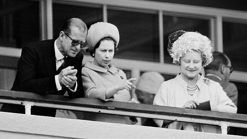 The Queen alongside Prince Philip and the Queen Mother