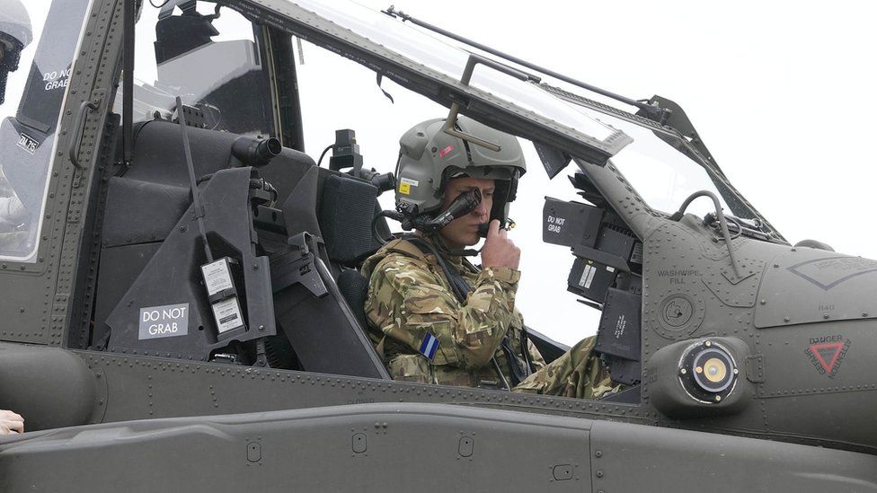 Prince William in the cockpit of a helicopter