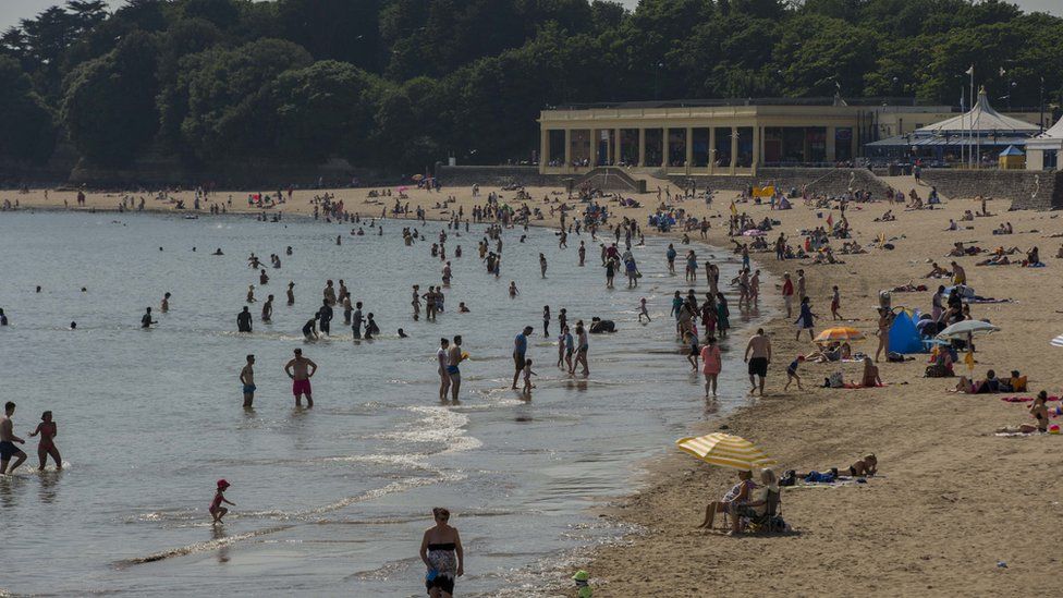 Sunbathers flocked to Barry Island this week during the sweltering heat