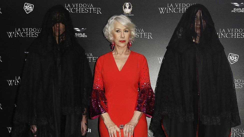 Dame Helen Mirren and companions at the premiere of her horror film Winchester