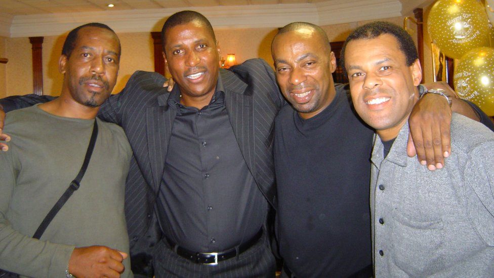 Former England and Nottingham Forest footballer Viv Anderson (pictured second left) and Basil Skyers (pictured right)