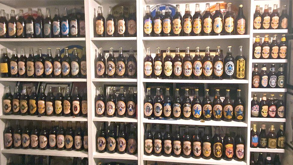 Shelves of bottles of Brown Ale