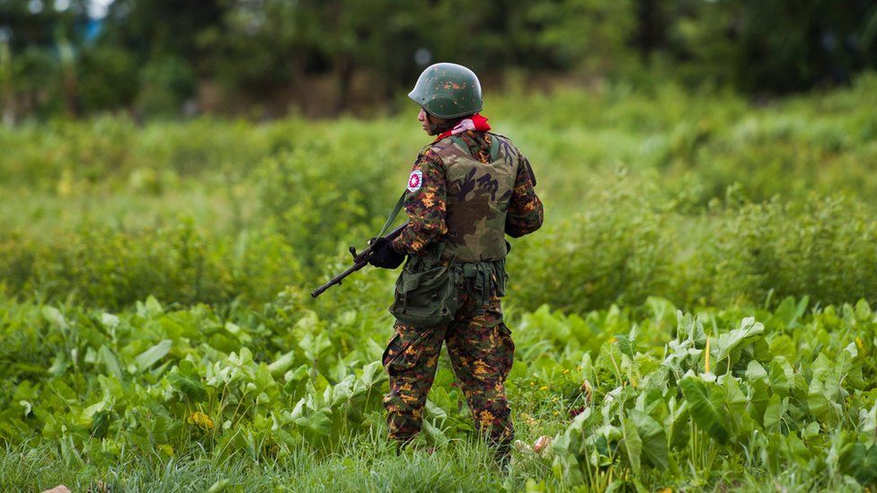 A Myanmar soldier stands on guard in Rakhine state in 2018