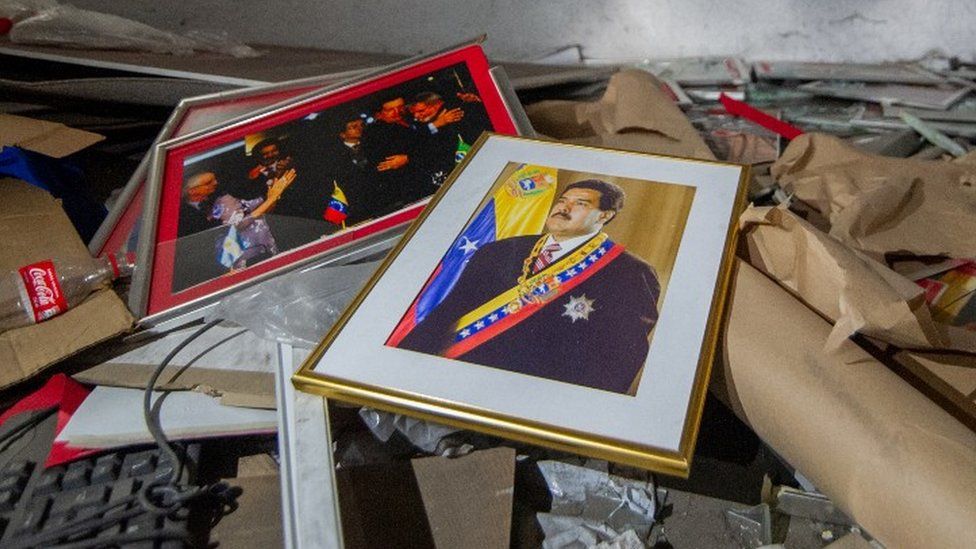 A framed picture of Nicolas Maduro remains at the Venezuelan consulate in Bogota, Colombia as it sits in ruins after being looted for months, on July 29, 2020, in Bogota, Colombia.