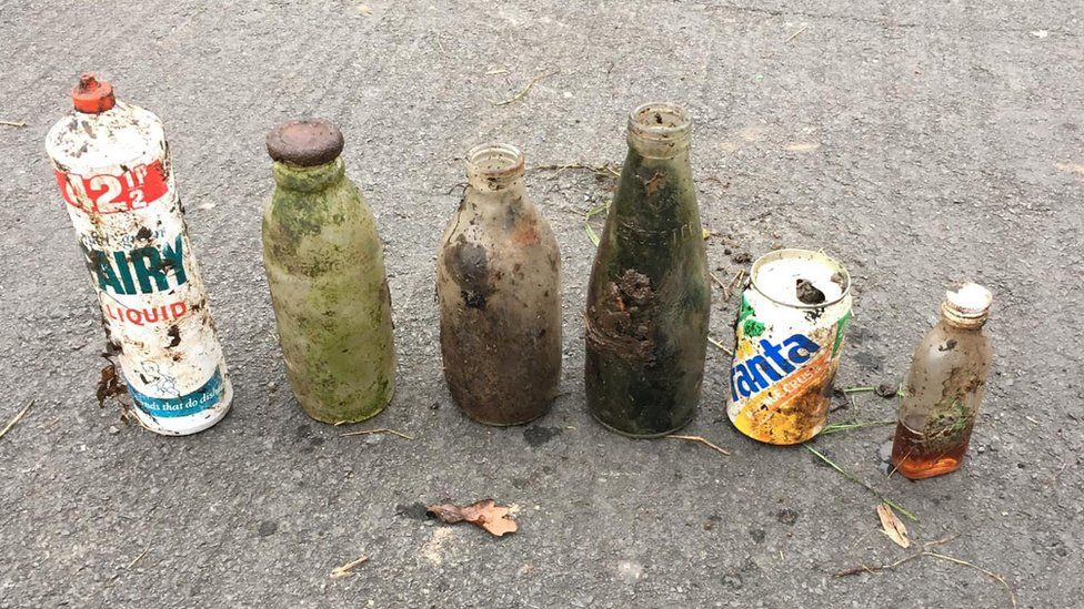 Collection of bottles and cans found