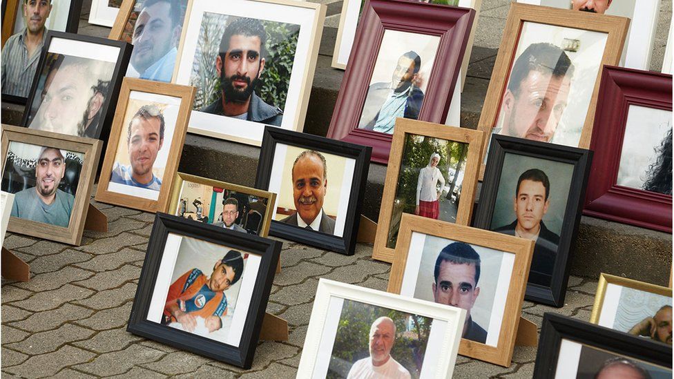Photos of missing Syrians on show at a campaign in Berlin