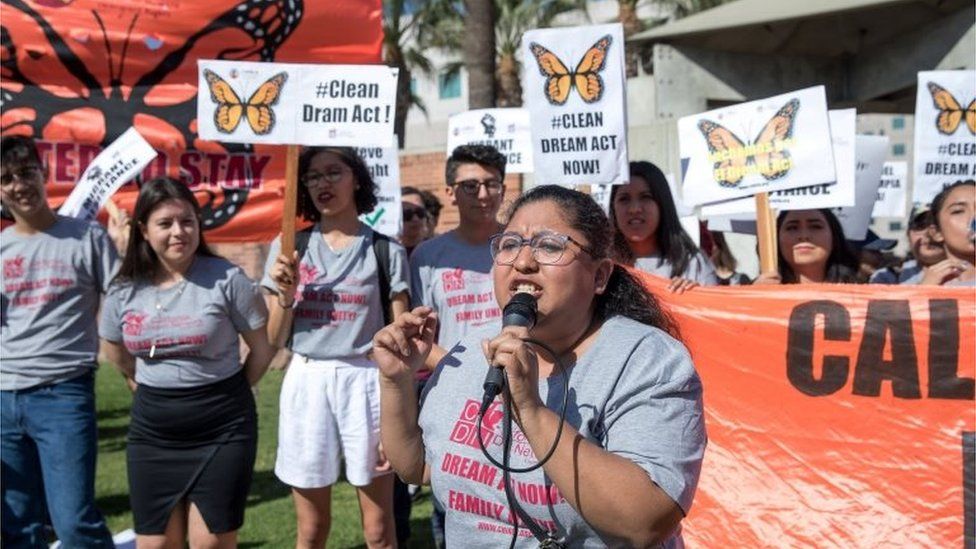A Daca recipient brought to the US when she was 4-years-old speaks at a Los Angeles rally.