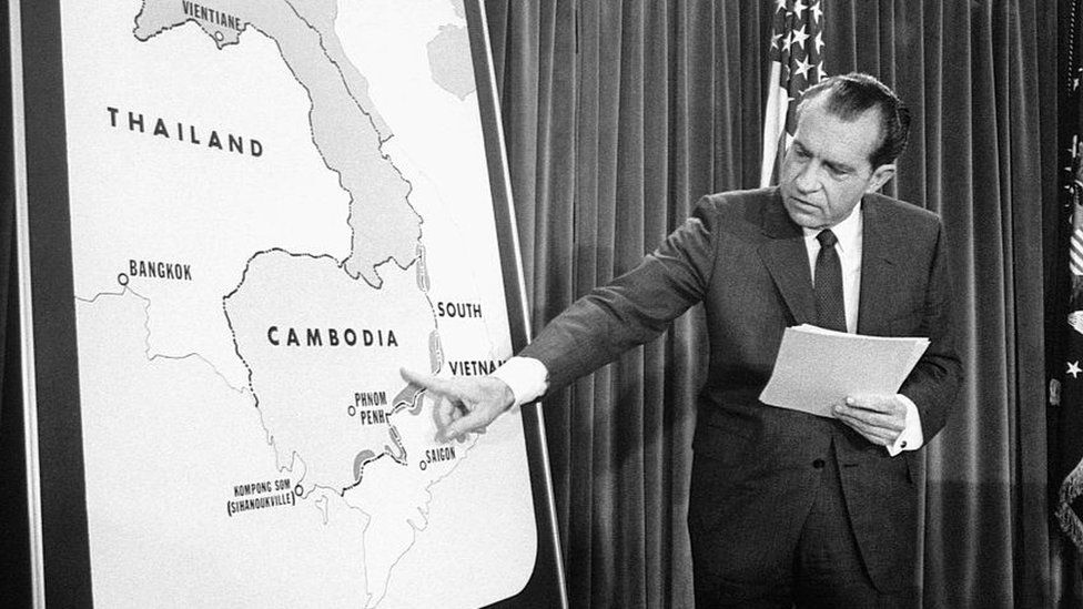 Richard Nixon points at a map of Cambodia