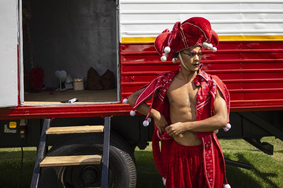 Mohamed Aqueel Ambraram changes backstage prior to a performance of the Circus Galassia in Johannesburg, South Africa.