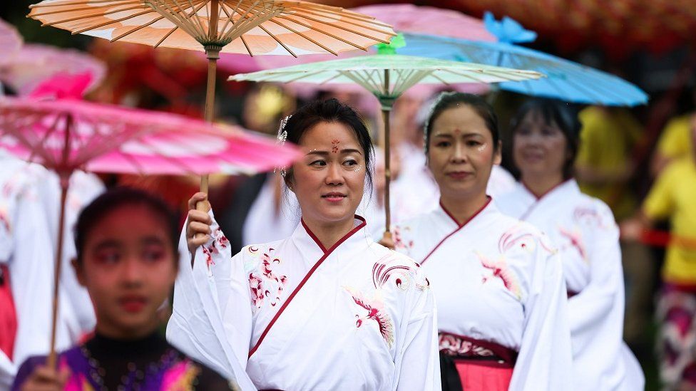 Women dressed in oriental costume at Belfast Mela