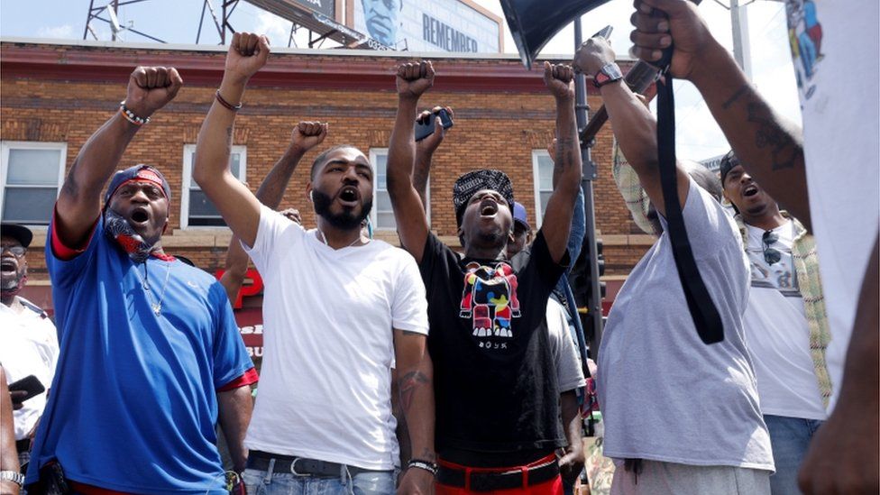 Demonstrators in Minneapolis chant on the anniversary of George Floyd's murder