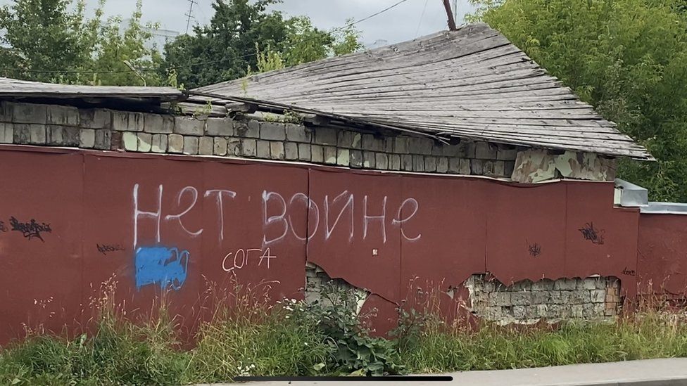 "No war" graffiti in Pskov