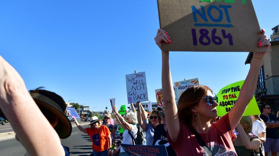 People protest in the district of Republican state Representative Matt Gress after Arizona's Supreme Court revived a law dating to 1864 that bans abortion in virtually all instances, in Scottsdale, Arizona, U.S. April 14, 2024.