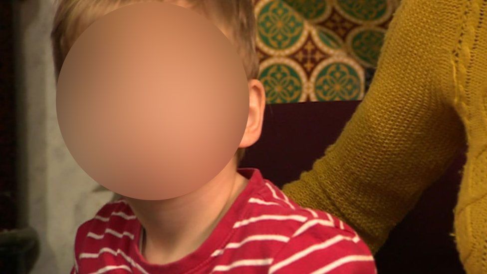 two-year-old boy (blurred)