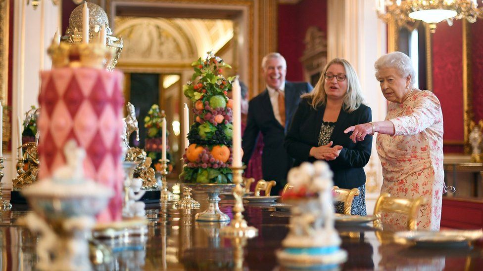 The Queen looks around the exhibition at Buckingham Palace