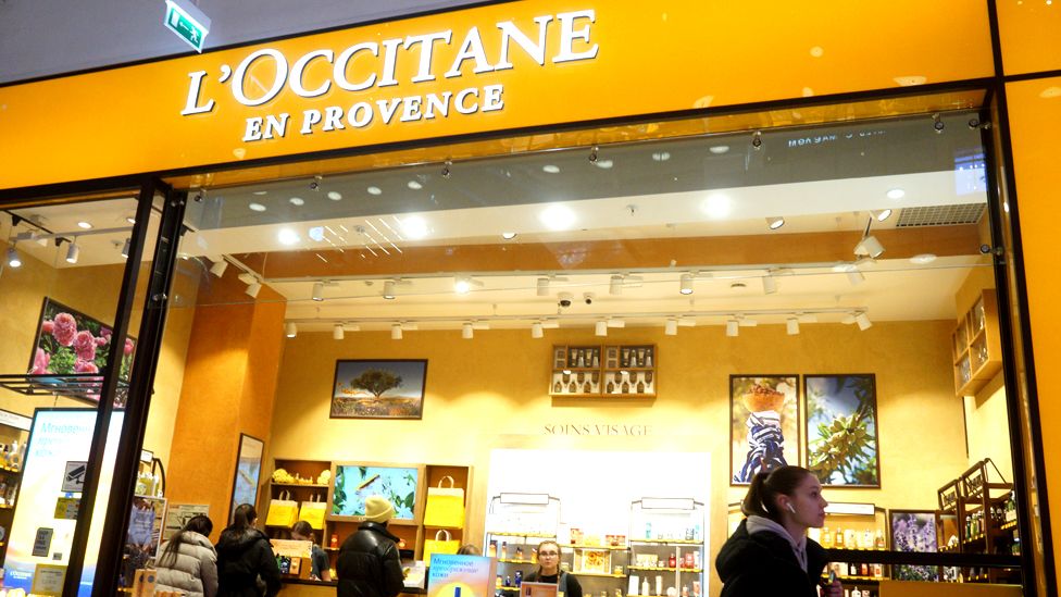 Customers shop at the L'Occitane en Provence store at a shopping center, 16 April 2022, in Moscow, Russia