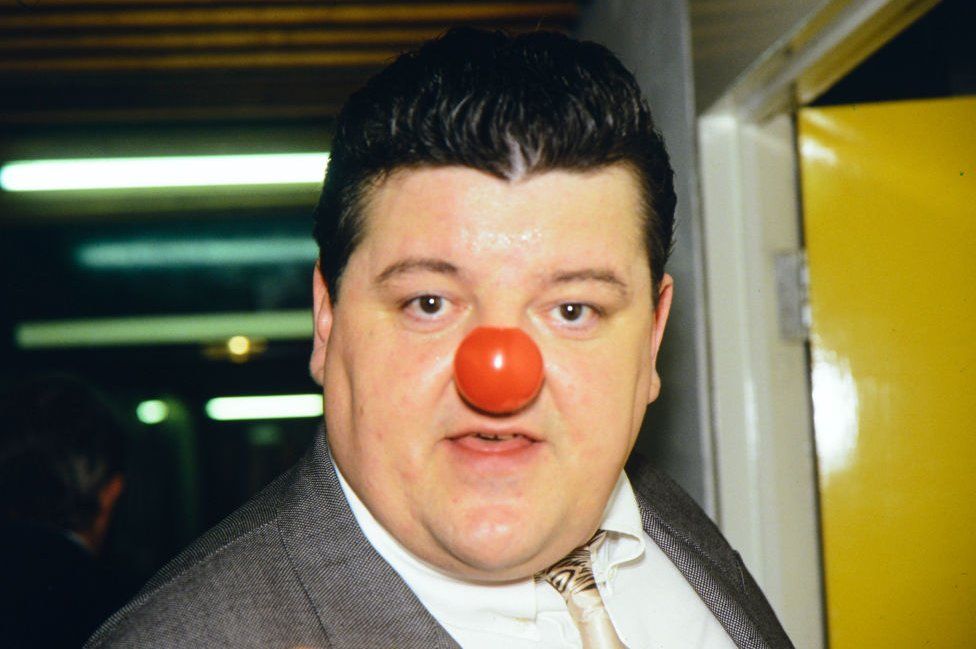 Robbie Coltrane with a red nose