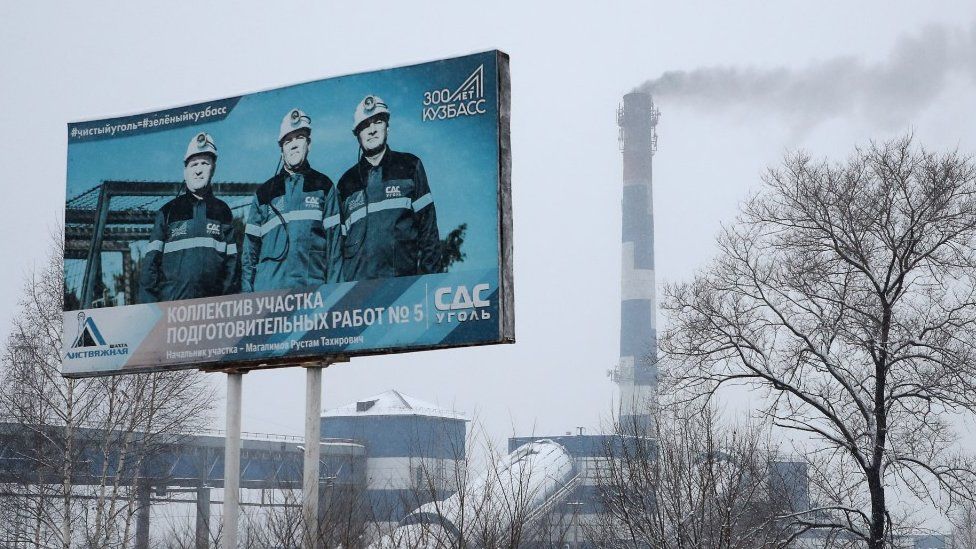 A banner advertising the Listvyazhnaya coal mine in the town of Belovo in the Kuznetsk Coal Basin in Kemerovo Region, southwestern Siberia