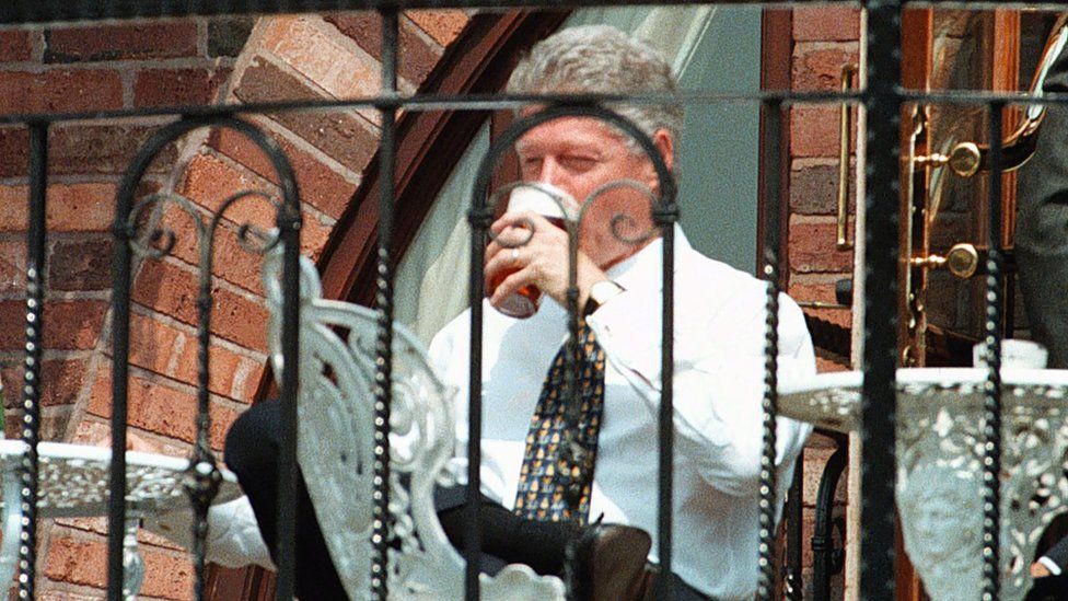 US President Bill Clinton drinking a pint
