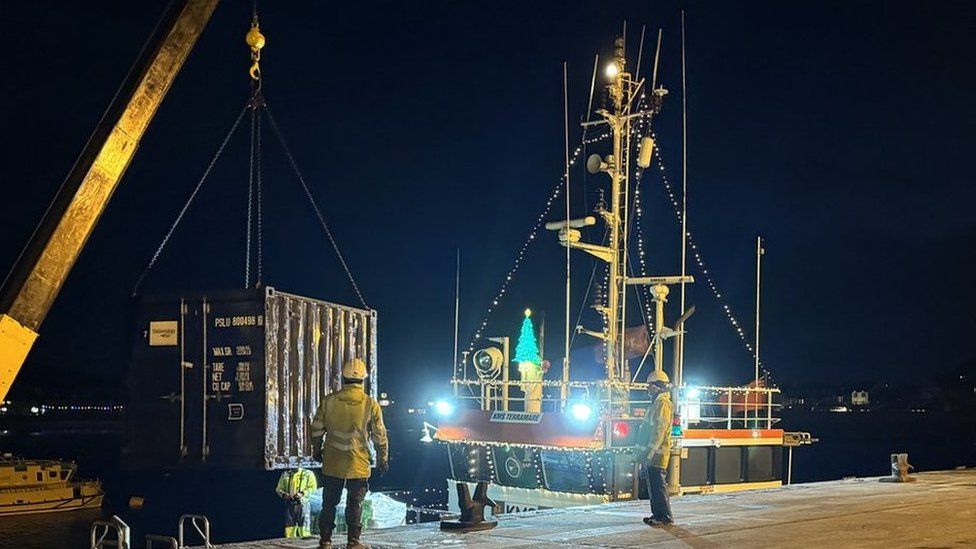 Boats arrive on Scilly bringing containers of food for the festive period