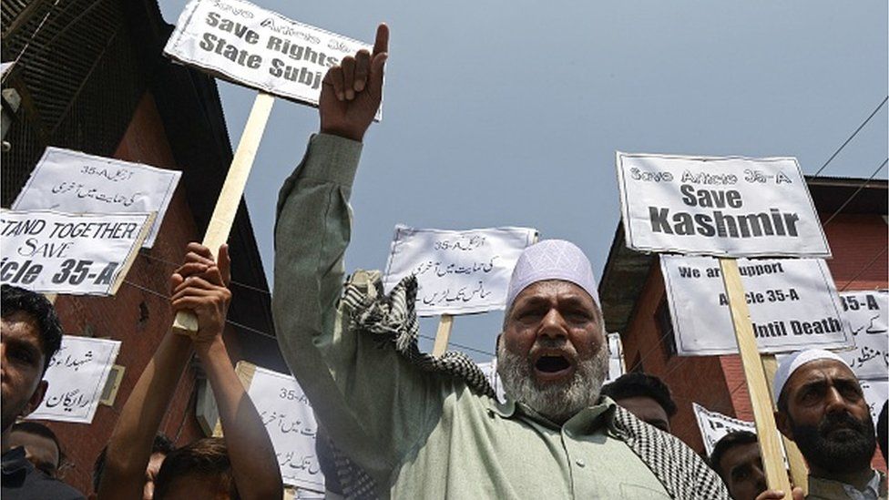 - Kashmiri Shiite Muslims shout anti-Indian slogans during a demonstration against attempts by the NGO 'We the Citizens' and individual citizens to revoke article 35A and 370, in Srinagar on August 24, 2018