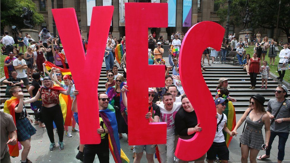 People celebrate after the announcement of the same-sex marriage postal survey result