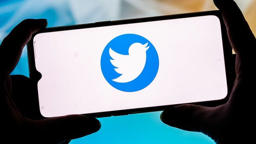 Smartphone displaying Twitter logo