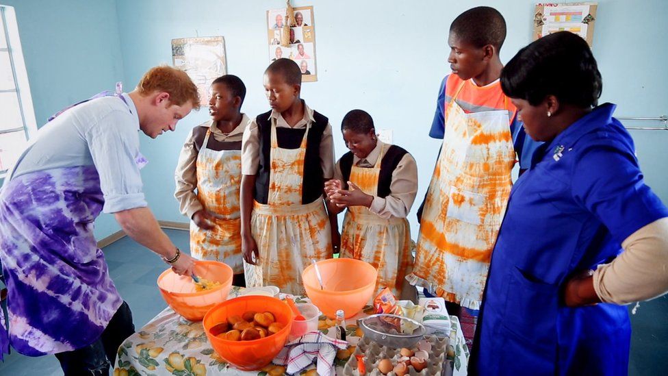 Prince Harry cooking with children in Lesotho