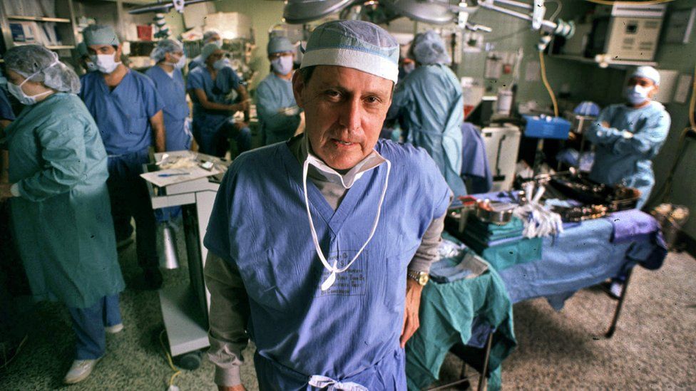 This 1989 file photo shows transplant pioneer Dr. Thomas E. Starzl as he oversees a liver transplant operation at the University of Pittsburgh Medical Center in Pittsburgh.