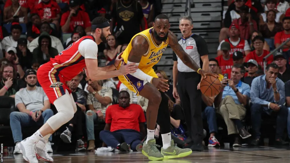 LeBron James Leads Los Angeles Lakers to Playoff Berth with Win Against New Orleans Pelicans.