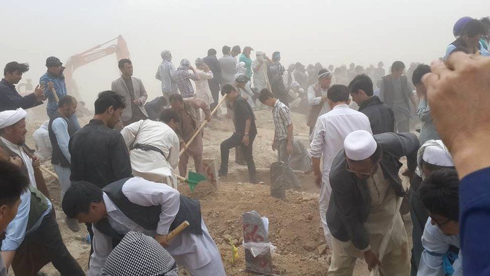 Graves are dug in Kabul, 24 July
