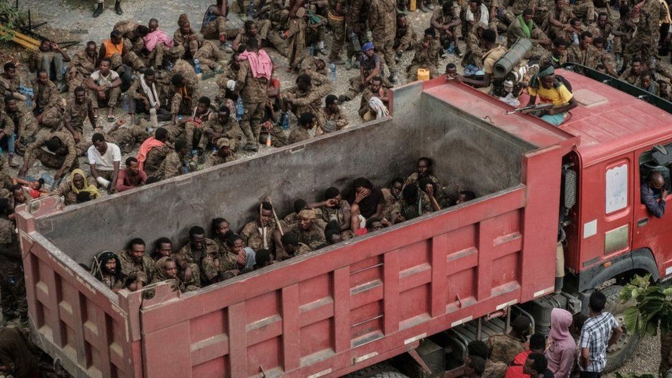 Wounded captive Ethiopian soldiers arrive on a truck at the Mekele Rehabilitation Center in Mekele, the capital of Tigray region, Ethiopia, on July 2, 2021.