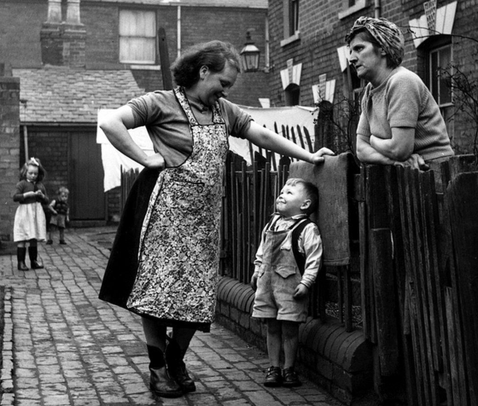 Neighbours talking in the street in Birmingham in 1964