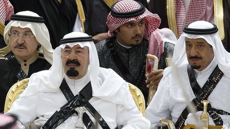 King Abdullah bin Abdulaziz (front left) and then-Prince Salman bin Abdul Aziz (R) attend a festival on the outskirts of Riyadh, Saudi Arabia (18 March 2008)