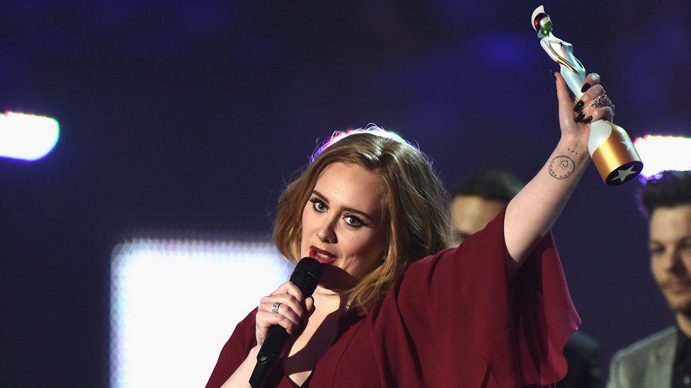 Adele wins her first trophy of the evening - British Female Solo Artist