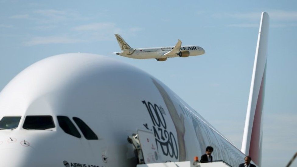 Boeing Dreamliner takes off as A380-800 plane taxis (file picture)