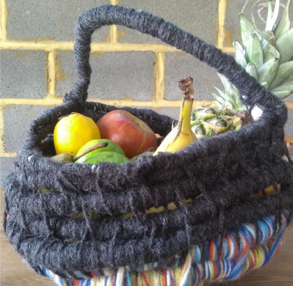 A fruit basket made from yarn