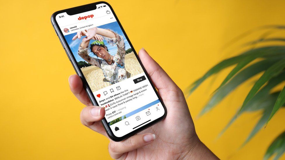 A smartphone with the Depop app open