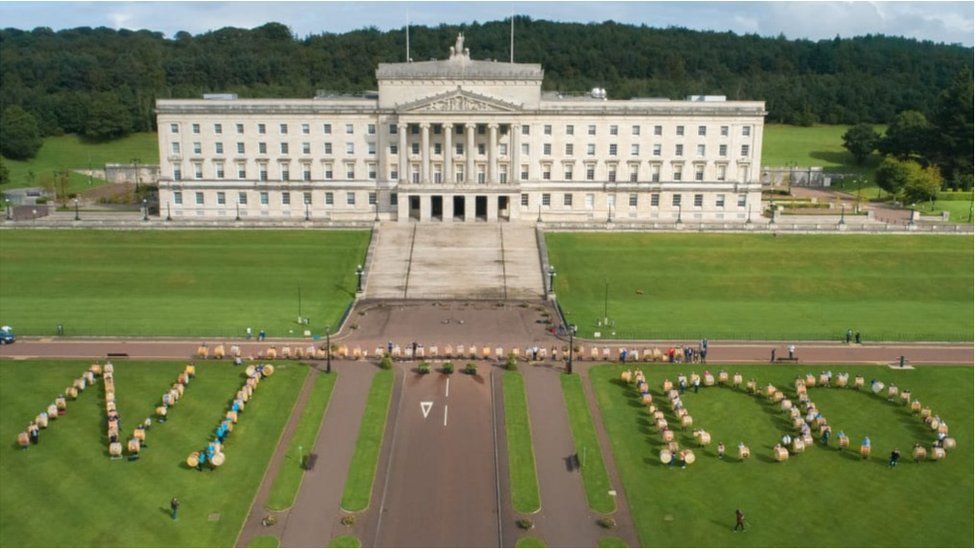 People gather outside Stormont with Lambeg drums