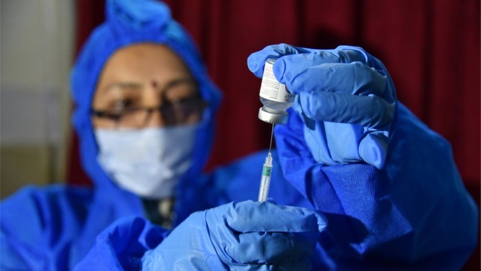 Medical worker preparing a vaccine